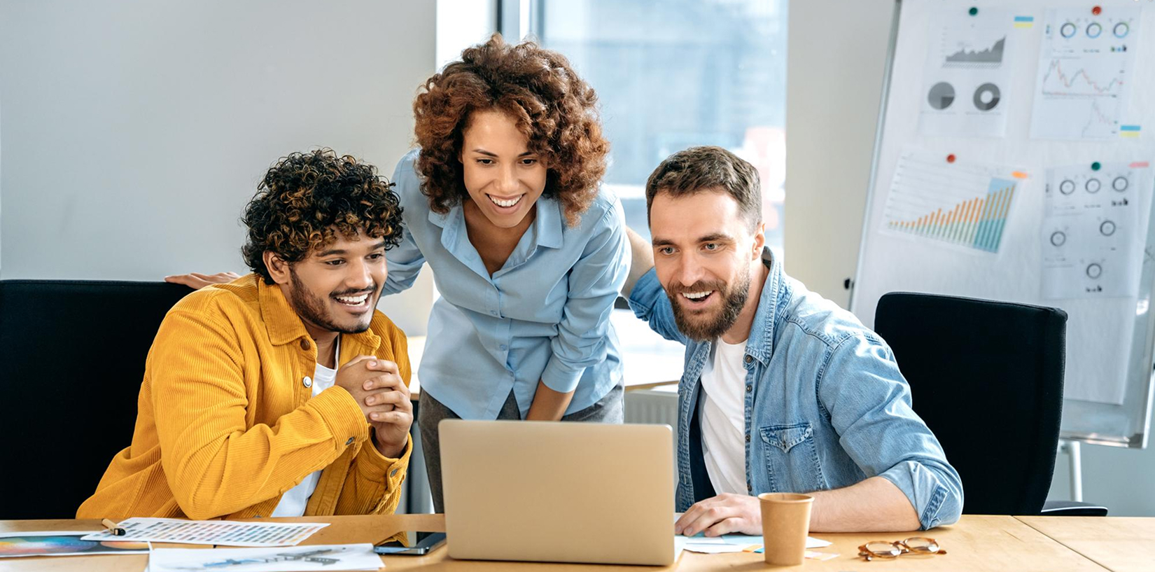 Vedrix team reviewing income tax filing on a laptop
